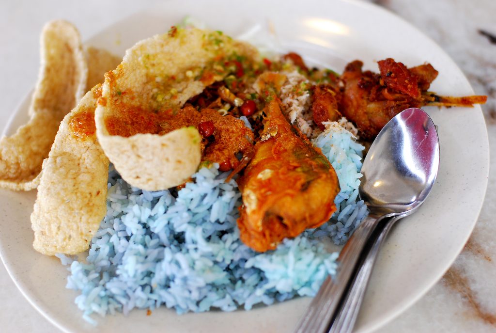 Nasi kerabu | image Courtesy: By amrufm from Shah Alam, Malaysia (Restoran Molek Opening) [CC BY 2.0], via Wikimedia Commons