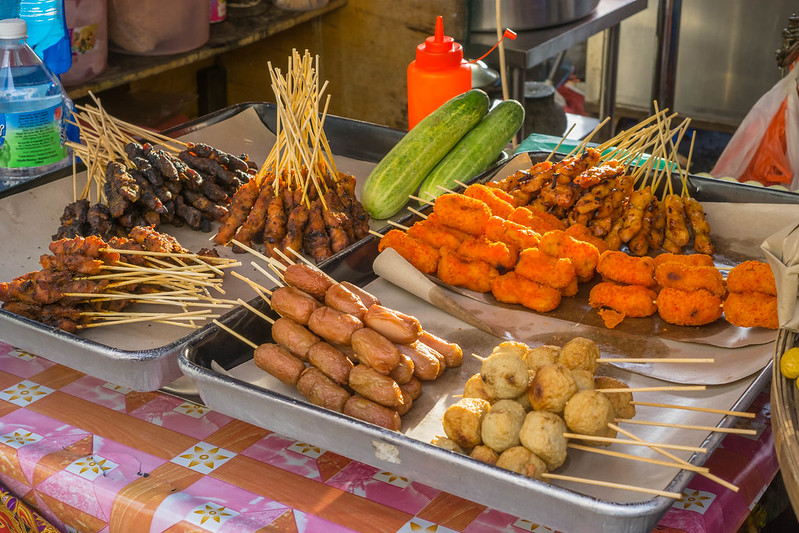 Street Food Vendor offering fried and grilled meat at Kasturi Walk in Kuala Lumpur