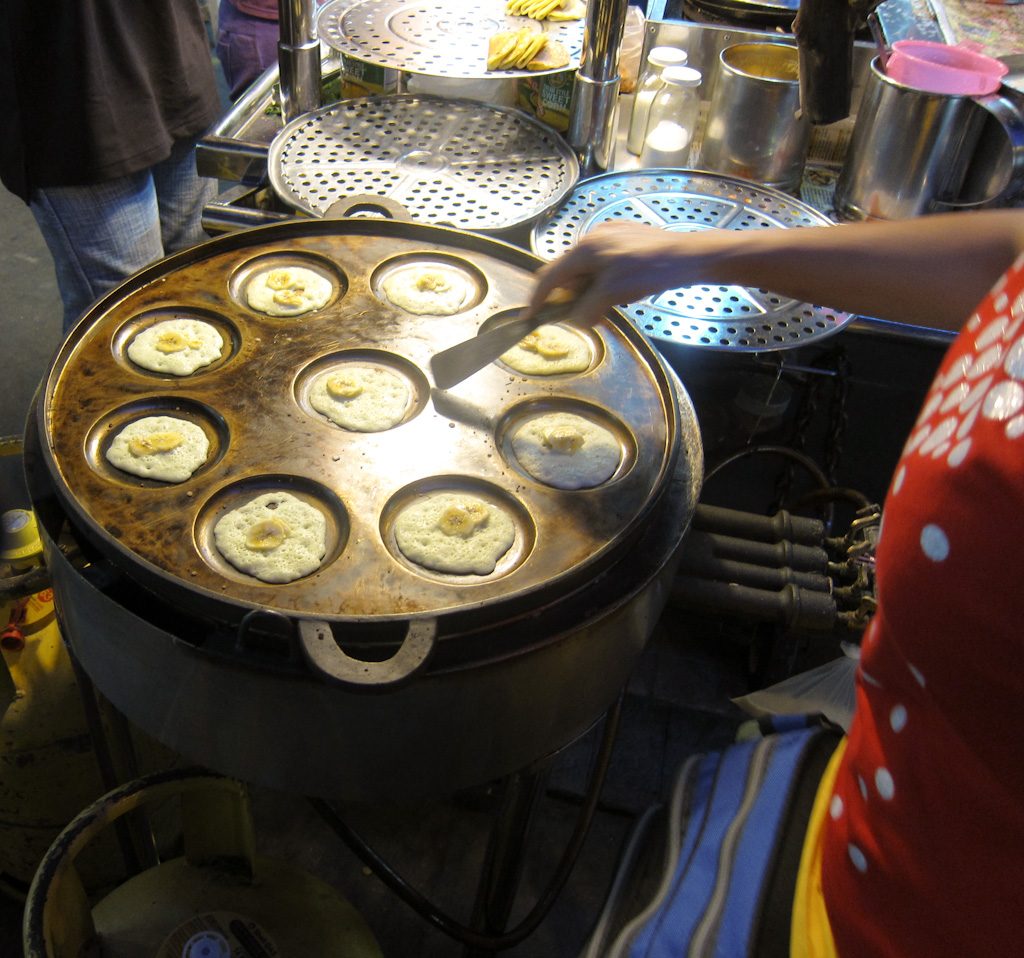 Baking apom in penang